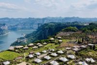 Pictured: A mountain-clinging homestay and camping base in Huawu Village, Qianxi, Bijie, Guizhou, China.